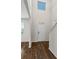 Entryway with hardwood floors and white front door provides access to living area at 3573 Stonebranch Ln, Loganville, GA 30052