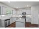 Beautiful kitchen with stainless steel appliances and granite countertops at 3573 Stonebranch Ln, Loganville, GA 30052