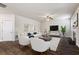 Cozy living room features hardwood floors, fireplace, and neutral decor at 3573 Stonebranch Ln, Loganville, GA 30052