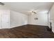Spacious living area with a fireplace, ceiling fan, and hardwood floors at 3573 Stonebranch Ln, Loganville, GA 30052