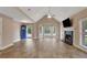 Inviting living room with fireplace, hardwood floors, and a view of the front yard at 4535 Clipper Bay Rd, Duluth, GA 30096