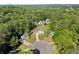 Aerial view of a home nestled in a lush, green landscape, offering a sense of peaceful privacy at 660 Cranberry Ct, Roswell, GA 30076