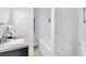 Bathroom sink with a tub and shower combination at 11 Poplar St, Porterdale, GA 30014