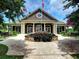 Charming community clubhouse with an American flag, perfect for gatherings and events at 111 Churchcliff Dr, Woodstock, GA 30188