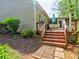 Spacious deck with steps leading down to the yard, ideal for outdoor relaxation and entertaining at 111 Churchcliff Dr, Woodstock, GA 30188