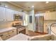 Modern kitchen with stainless steel appliances, white cabinets, and ample counter space at 111 Churchcliff Dr, Woodstock, GA 30188