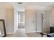 Empty bedroom with carpeted floor, lamp, window, neutral walls, and a dark dresser at 115 N Loblolly Xing, Temple, GA 30179