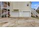 Spacious three-car garage with two garage doors and parking area at 115 N Loblolly Xing, Temple, GA 30179