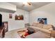 Comfortable living room with plush seating, a coffee table, and movie posters at 115 N Loblolly Xing, Temple, GA 30179
