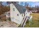 Charming home featuring a spacious yard, elevated deck, and convenient two-car garage at 115 N Loblolly Xing, Temple, GA 30179