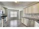 Kitchen with stainless appliances, granite countertops, and gray backsplash at 4199 Wyndham Park Way, Buford, GA 30519