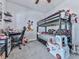 This bedroom features a bunk bed, carpet, and a desk at 132 Neese Farm Dr, Woodstock, GA 30188