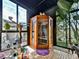 Backyard home sauna featuring wood floors and lush garden views at 132 Neese Farm Dr, Woodstock, GA 30188