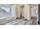 Bathroom featuring soaking tub and separate shower at 23 Dynasty Dr, Fairburn, GA 30213