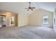 Bedroom featuring carpet floors, ceiling fan, a doorway, and plenty of natural light at 23 Dynasty Dr, Fairburn, GA 30213