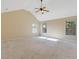 A spacious bedroom with high ceilings and natural light from multiple windows at 23 Dynasty Dr, Fairburn, GA 30213