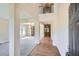 Grand foyer with soaring ceilings, hardwood floors, and an open view to the living spaces at 23 Dynasty Dr, Fairburn, GA 30213