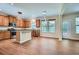 Modern kitchen features an island and flows into the sunny eating area and well-lit backyard at 23 Dynasty Dr, Fairburn, GA 30213