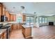 Modern kitchen with stainless steel appliances, granite countertops, and a central island at 23 Dynasty Dr, Fairburn, GA 30213