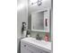 Clean bathroom features a modern sink and vanity, with a square mirror and sleek fixtures at 1099 Mount Water Ln, Lawrenceville, GA 30043