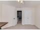 Bright bedroom featuring neutral walls, carpeted floors, and a ceiling fan at 1099 Mount Water Ln, Lawrenceville, GA 30043