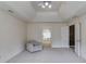 Bright main bedroom with an ensuite bathroom and walk-in closet for a luxurious retreat at 1099 Mount Water Ln, Lawrenceville, GA 30043