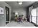 Yet another view of office space with carpeting and a view to another room at 1099 Mount Water Ln, Lawrenceville, GA 30043
