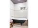 Elegant bathroom features a clawfoot tub, white subway tile, and classic fixtures, creating a vintage aesthetic at 1868 Gordon Ne Mnr, Atlanta, GA 30307