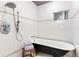 Elegant bathroom featuring a clawfoot tub, subway tile walls, and neutral accents for a luxurious spa-like experience at 1868 Gordon Ne Mnr, Atlanta, GA 30307