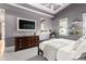 Spacious bedroom featuring a large TV, ample natural light, and stylish furnishings for ultimate comfort at 1868 Gordon Ne Mnr, Atlanta, GA 30307