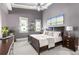 Spacious bedroom featuring a bed, two windows, and decor at 1868 Gordon Ne Mnr, Atlanta, GA 30307