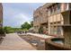 Expansive brick courtyard featuring a serene fountain and outdoor seating with a view, a tranquil space for relaxation at 1868 Gordon Ne Mnr, Atlanta, GA 30307