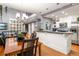 Open-concept living space with dining area and adjacent kitchen at 1868 Gordon Ne Mnr, Atlanta, GA 30307