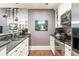 Modern kitchen with stainless steel appliances and stylish fixtures at 1868 Gordon Ne Mnr, Atlanta, GA 30307