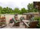 Charming patio featuring comfortable chairs, a round table, and potted plants for a cozy outdoor experience at 1868 Gordon Ne Mnr, Atlanta, GA 30307