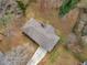 Aerial view of a cozy single-Gathering home with a well-maintained roof and spacious backyard at 2588 Shady Sw Ln, Conyers, GA 30094