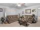 Comfortable living room with two sofas, coffee table, and large window with natural light at 2588 Shady Sw Ln, Conyers, GA 30094