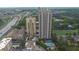 Aerial view of tall buildings with surrounding cityscape, highways, and pool at 795 Hammond Dr # 808, Atlanta, GA 30328
