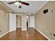 Bedroom featuring hardwood floors, a closet, and ensuite bathroom access at 795 Hammond Dr # 808, Atlanta, GA 30328