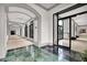 Hallway featuring elegant flooring, recessed lighting, and a view of an entryway at the end of the hall at 795 Hammond Dr # 808, Atlanta, GA 30328