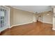 Bright, open living room features hardwood floors and a balcony door offering natural light at 795 Hammond Dr # 808, Atlanta, GA 30328