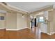 Spacious living room with hardwood floors adjacent to an updated kitchen at 795 Hammond Dr # 808, Atlanta, GA 30328