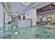 Elegant lobby featuring sleek floors, modern lighting, a reception area and comfortable seating near elevators at 795 Hammond Dr # 808, Atlanta, GA 30328