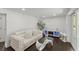 A finished basement boasts recessed lighting, sleek flooring, and a comfortable seating area at 2120 Pair Sw Rd, Marietta, GA 30008