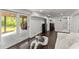 Finished basement with walkout access and modern design includes a beverage cooler and laundry at 2120 Pair Sw Rd, Marietta, GA 30008