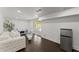 Finished basement features recessed lights, sleek flooring, and a mini fridge at 2120 Pair Sw Rd, Marietta, GA 30008