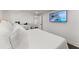 Modern bedroom with large wall-mounted television and contemporary furnishings at 2120 Pair Sw Rd, Marietta, GA 30008