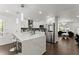 Modern kitchen featuring an island with a marble countertop and stainless steel appliances at 2120 Pair Sw Rd, Marietta, GA 30008
