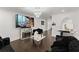 Cozy living area featuring modern decor, stylish fireplace, and comfortable seating at 2120 Pair Sw Rd, Marietta, GA 30008