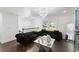 Bright living room featuring modern decor, chandeliers, and plush seating at 2120 Pair Sw Rd, Marietta, GA 30008